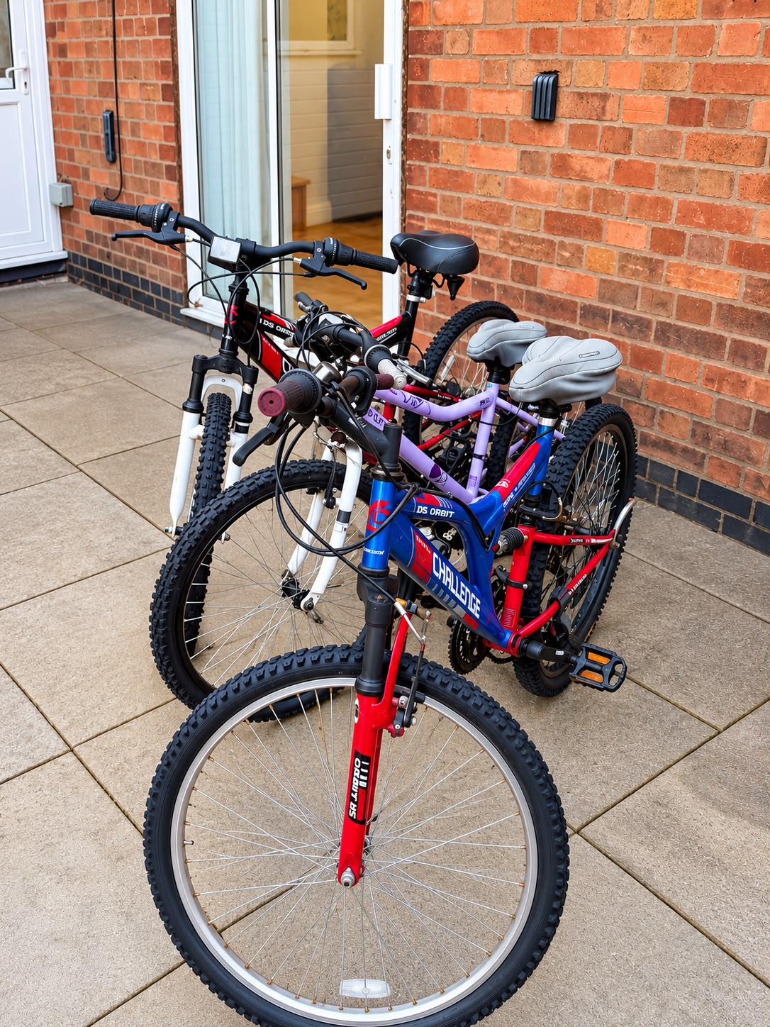 Bikes ready to ride outside the back of Ivie Lodge